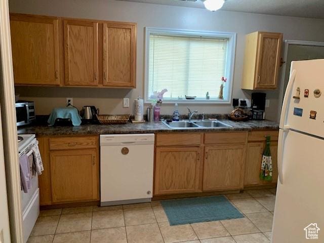 818 S 50 E, Vernal, UT 84078 - kitchen with light tile patterned flooring, white appliances, and sink