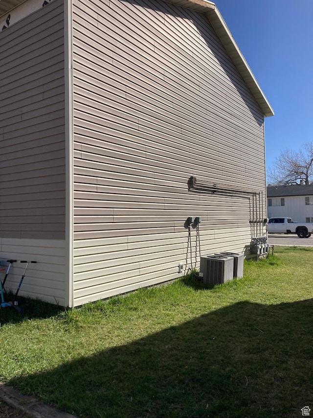 818 S 50 E, Vernal, UT 84078 - view of property exterior with a yard and central AC unit