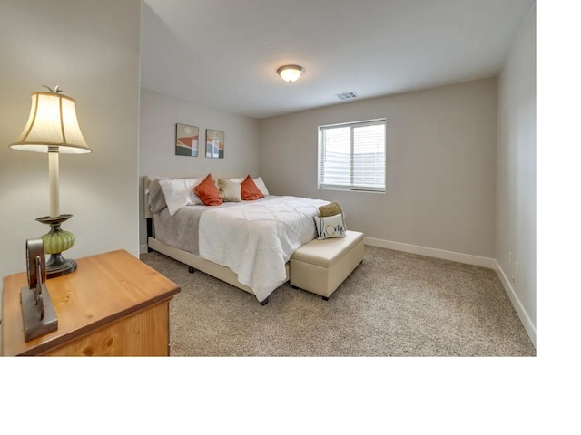 bedroom with light carpet, baseboards, and visible vents