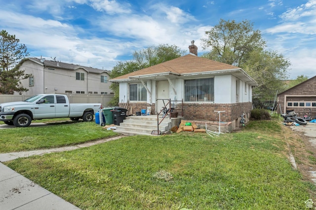 1790 W Sugar Factory Rd, West Jordan, UT 84088 - view of front of home featuring a front yard