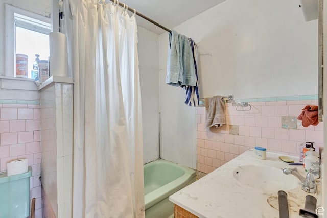 1790 W Sugar Factory Rd, West Jordan, UT 84088 - bathroom featuring vanity, shower / tub combo, and tile walls