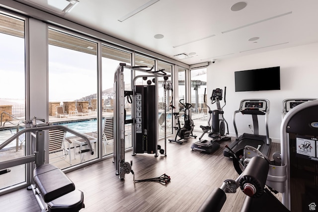 2752 W High Rd Unit 1501, Park City, UT 84098 - exercise room featuring floor to ceiling windows and hardwood / wood-style floors