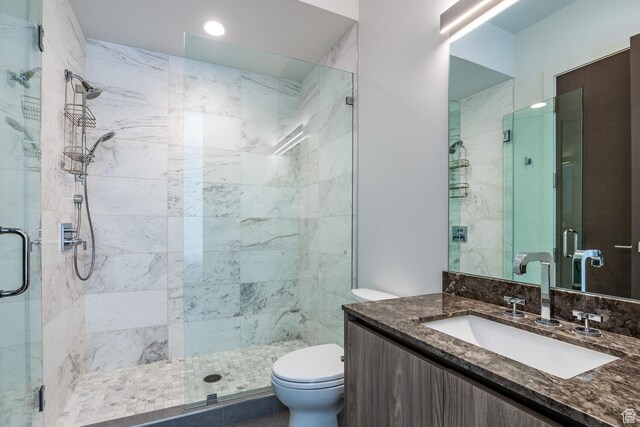 2752 W High Rd Unit 1501, Park City, UT 84098 - bathroom with a shower with shower door, vanity, and toilet
