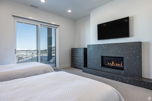 2752 W High Rd Unit 1501, Park City, UT 84098 - carpeted bedroom with a premium fireplace and access to exterior