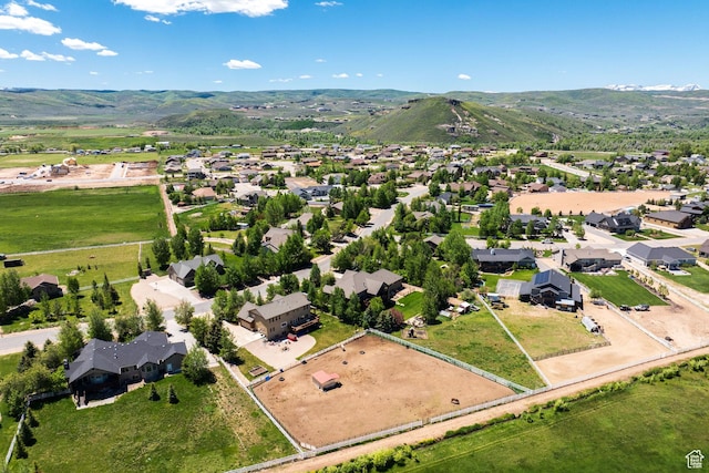 drone / aerial view with a mountain view and a residential view