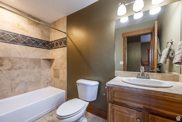 full bath with toilet, vanity, and washtub / shower combination