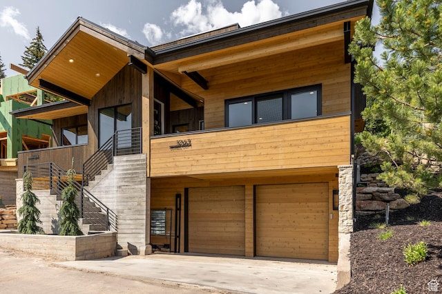 1063 Lowell Ave Unit 1, Park City, UT 84060 - contemporary home with stairs, a garage, and driveway