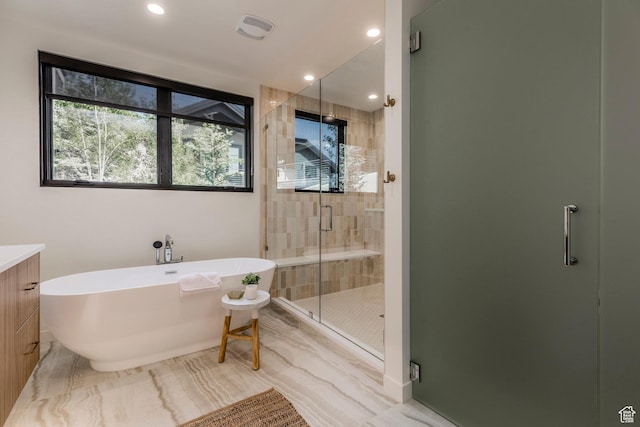 1063 Lowell Ave Unit 1, Park City, UT 84060 - bathroom featuring a soaking tub, a shower stall, recessed lighting, and vanity