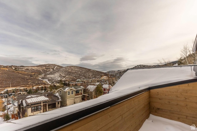 balcony featuring a mountain view and a residential view