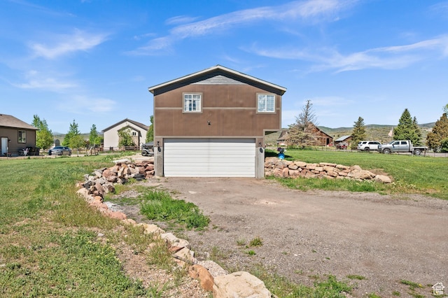 1635 W 200 S, Kamas, UT 84036 - view of home's exterior with a yard and a garage