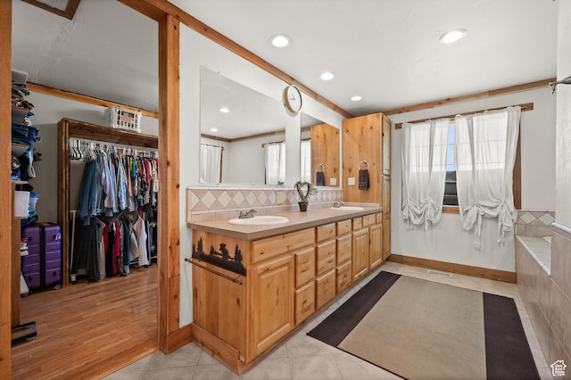 1635 W 200 S, Kamas, UT 84036 - bathroom featuring tasteful backsplash, tile patterned flooring, vanity, and ornamental molding