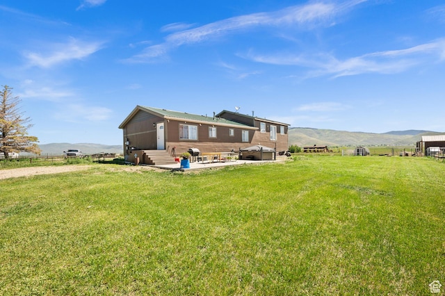 1635 W 200 S, Kamas, UT 84036 - rear view of property featuring a mountain view, a rural view, a yard, and a patio