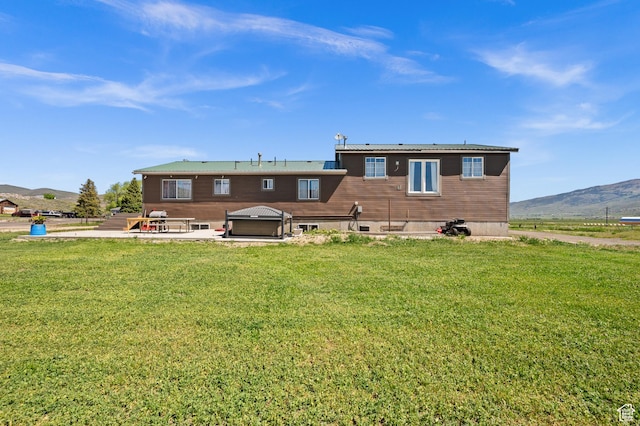 1635 W 200 S, Kamas, UT 84036 - rear view of house with a lawn, a mountain view, a patio area, and a hot tub