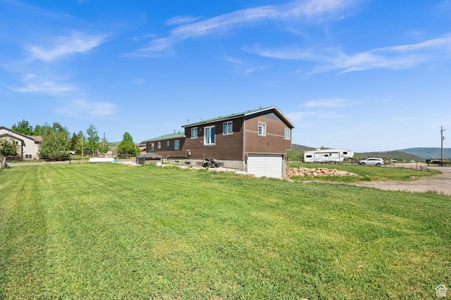 1635 W 200 S, Kamas, UT 84036 - exterior space with a mountain view, a garage, and a yard