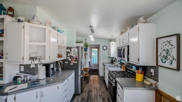 33432 W 8000 S, Duchesne, UT 84021 - kitchen featuring stainless steel appliances, backsplash, white cabinets, and dark wood-type flooring