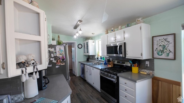 33432 W 8000 S, Duchesne, UT 84021 - kitchen featuring stainless steel appliances, white cabinets, and backsplash