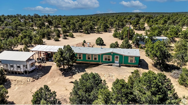 drone / aerial view with a forest view