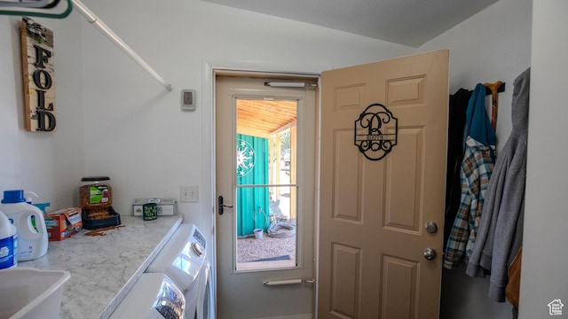 33432 W 8000 S, Duchesne, UT 84021 - entryway featuring washer and dryer and vaulted ceiling