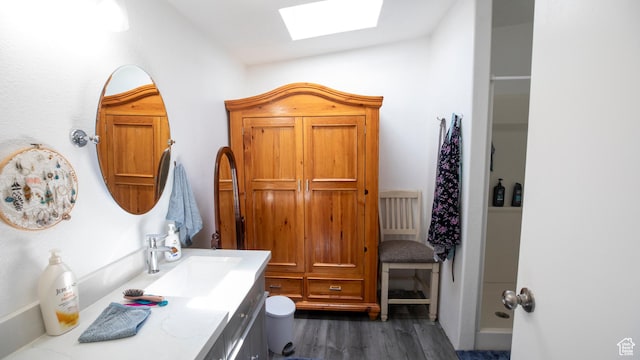33432 W 8000 S, Duchesne, UT 84021 - bathroom featuring a skylight, vanity, and wood finished floors