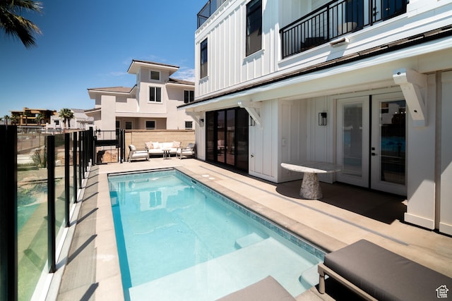 5420 S Persian Ln, St George, UT 84790 - view of swimming pool featuring a patio area and an outdoor hangout area