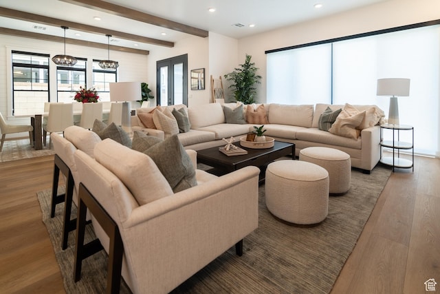 5420 S Persian Ln, St George, UT 84790 - living room featuring wood-type flooring and beam ceiling