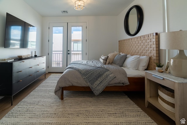 5420 S Persian Ln, St George, UT 84790 - bedroom featuring access to outside, french doors, and dark hardwood / wood-style floors