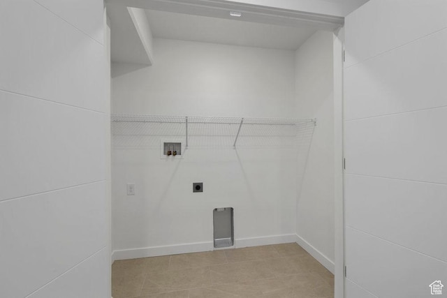 439 N 268 W Unit 4-18, Salt Lake City, UT 84103 - clothes washing area featuring washer hookup, hookup for an electric dryer, baseboards, and light tile patterned floors