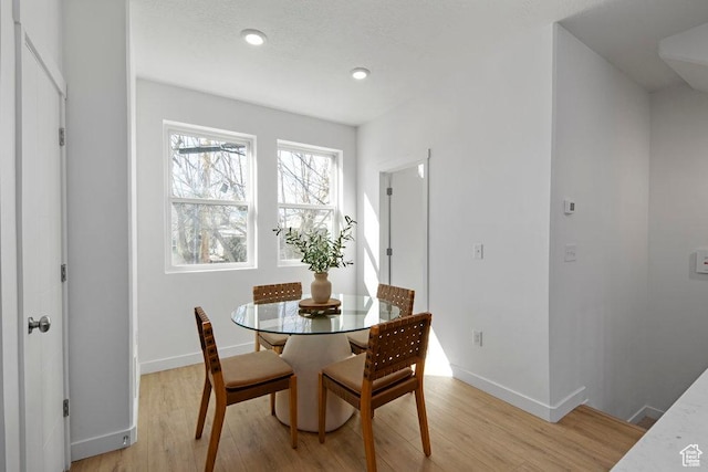 439 N 268 W Unit 4-18, Salt Lake City, UT 84103 - dining area with light wood finished floors, baseboards, and recessed lighting