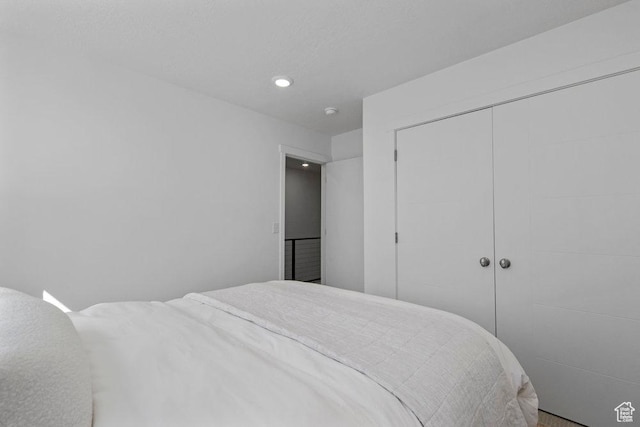 439 N 268 W Unit 4-18, Salt Lake City, UT 84103 - bedroom featuring a closet and recessed lighting