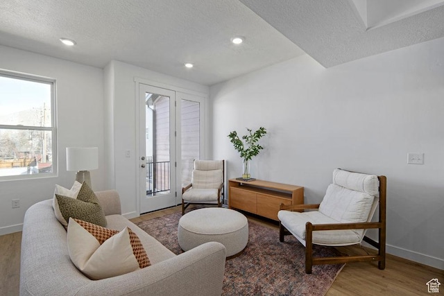 439 N 268 W Unit 4-18, Salt Lake City, UT 84103 - living room with a textured ceiling, wood finished floors, baseboards, and recessed lighting