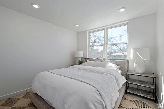 439 N 268 W Unit 4-18, Salt Lake City, UT 84103 - bedroom with recessed lighting, baseboards, and carpet flooring