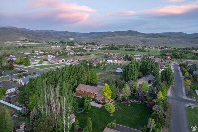 3383 Wild Mare Way, Heber City, UT 84032 - aerial view of property and surrounding area with a mountainous background and nearby suburban area