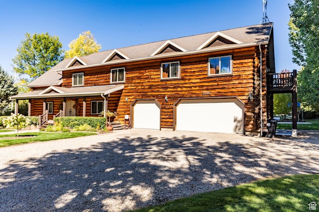 3383 Wild Mare Way, Heber City, UT 84032 - cabin featuring a porch, log exterior, and driveway
