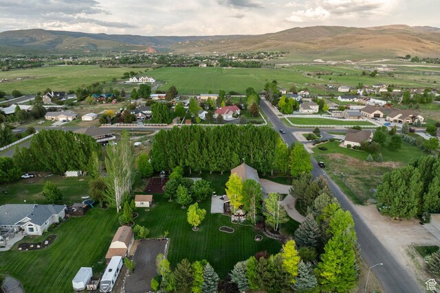 3383 Wild Mare Way, Heber City, UT 84032 - aerial view of property and surrounding area featuring a mountain backdrop and nearby suburban area