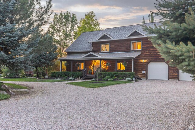 3383 Wild Mare Way, Heber City, UT 84032 - view of front of property with covered porch, driveway, a garage, and a shingled roof