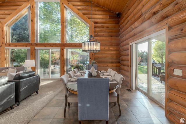 3383 Wild Mare Way, Heber City, UT 84032 - dining area featuring healthy amount of natural light, a chandelier, wood ceiling, rustic walls, and high vaulted ceiling