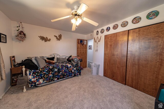 2317 N Hillside Dr, Wellington, UT 84542 - carpeted bedroom with a closet and a ceiling fan