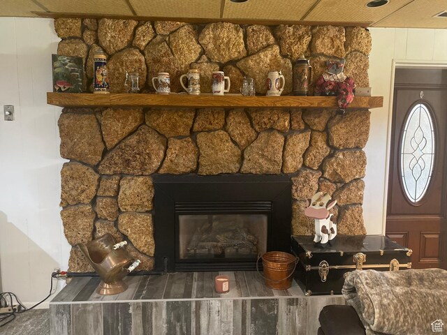 2317 N Hillside Dr, Wellington, UT 84542 - details with a fireplace, a decorative wall, and visible vents