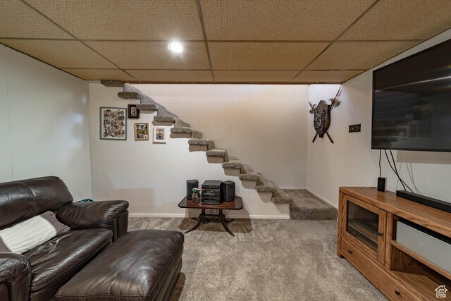 2317 N Hillside Dr, Wellington, UT 84542 - living room with carpet floors, stairs, and a paneled ceiling