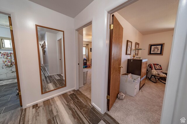 2317 N Hillside Dr, Wellington, UT 84542 - corridor with baseboards and wood finished floors