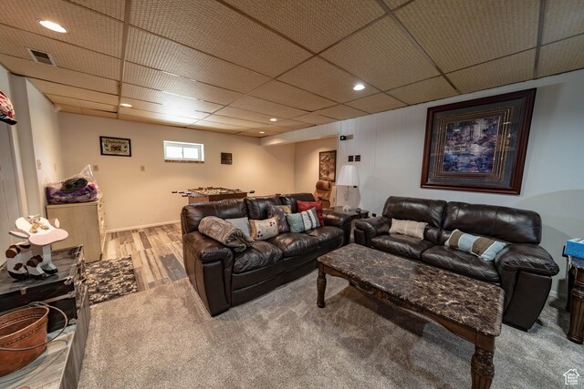 2317 N Hillside Dr, Wellington, UT 84542 - carpeted living area with baseboards, wood finished floors, visible vents, and recessed lighting