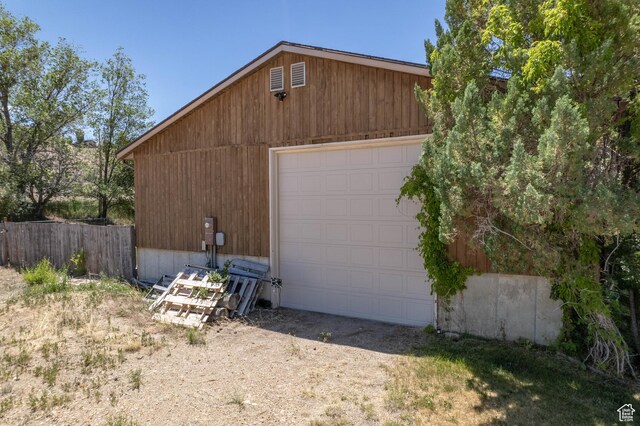 2317 N Hillside Dr, Wellington, UT 84542 - garage with fence