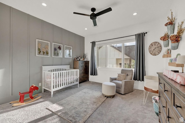 8122 S Willow Creek Cv, Cottonwood Heights, UT 84093 - carpeted bedroom with a crib and ceiling fan