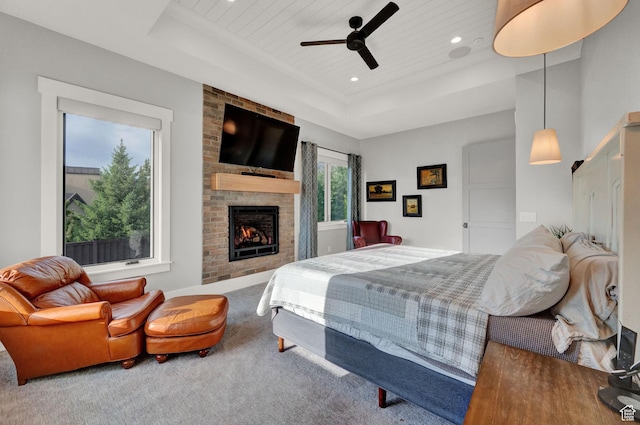 8122 S Willow Creek Cv, Cottonwood Heights, UT 84093 - bedroom with a raised ceiling, carpet flooring, a fireplace, and wood ceiling