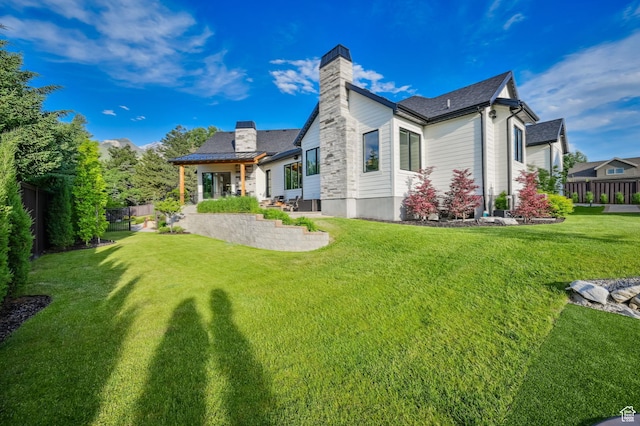8122 S Willow Creek Cv, Cottonwood Heights, UT 84093 - back of house with a yard and a patio