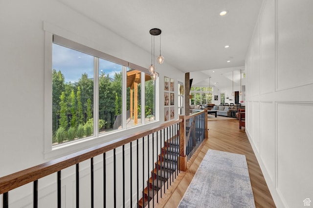 8122 S Willow Creek Cv, Cottonwood Heights, UT 84093 - corridor with light hardwood / wood-style flooring