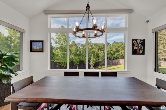 8122 S Willow Creek Cv, Cottonwood Heights, UT 84093 - dining area featuring vaulted ceiling and a notable chandelier