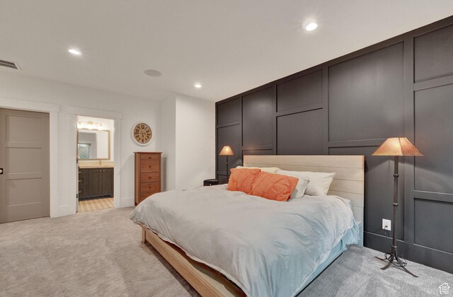 8122 S Willow Creek Cv, Cottonwood Heights, UT 84093 - bedroom with ensuite bathroom and light carpet