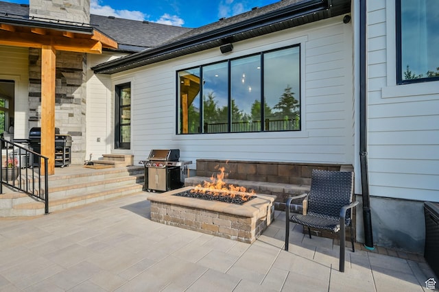 8122 S Willow Creek Cv, Cottonwood Heights, UT 84093 - view of patio featuring area for grilling and a fire pit