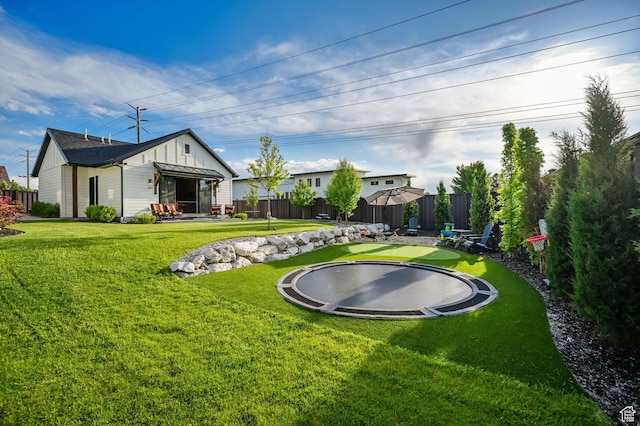 8122 S Willow Creek Cv, Cottonwood Heights, UT 84093 - view of yard featuring a trampoline